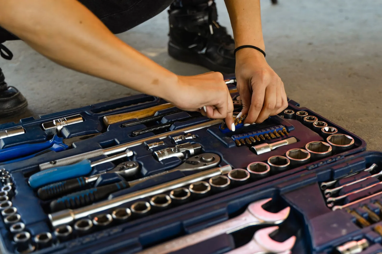 A workshop wall hung with well-used hand tools