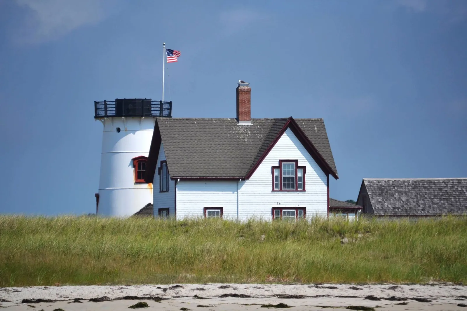 Post-war cape cod house on a suburban lot
