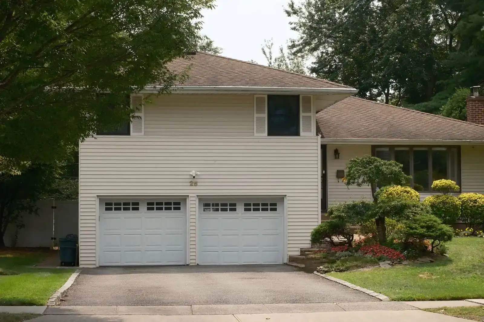Split-level suburban house with a driveway