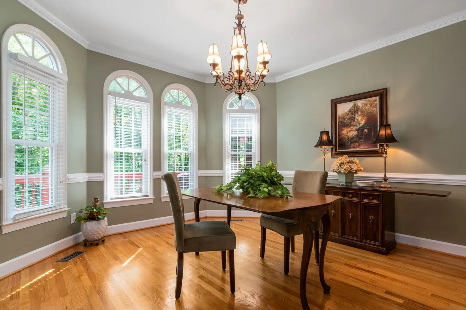 Wood crown molding along an interior ceiling
