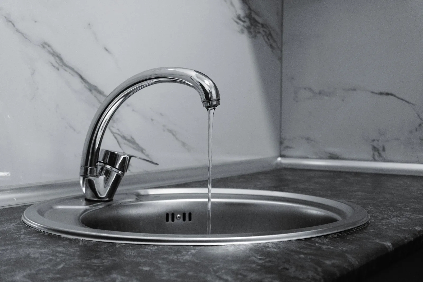 Kitchen sink drain and garbage disposal connections